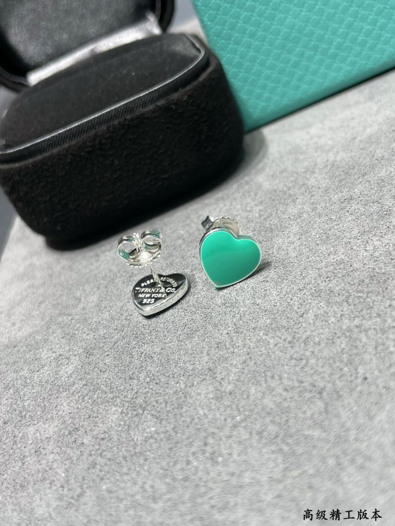 T*f*ny earrings